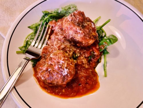 Meaty Fennel Meatballs Over Wilted Spinach – Recipe!