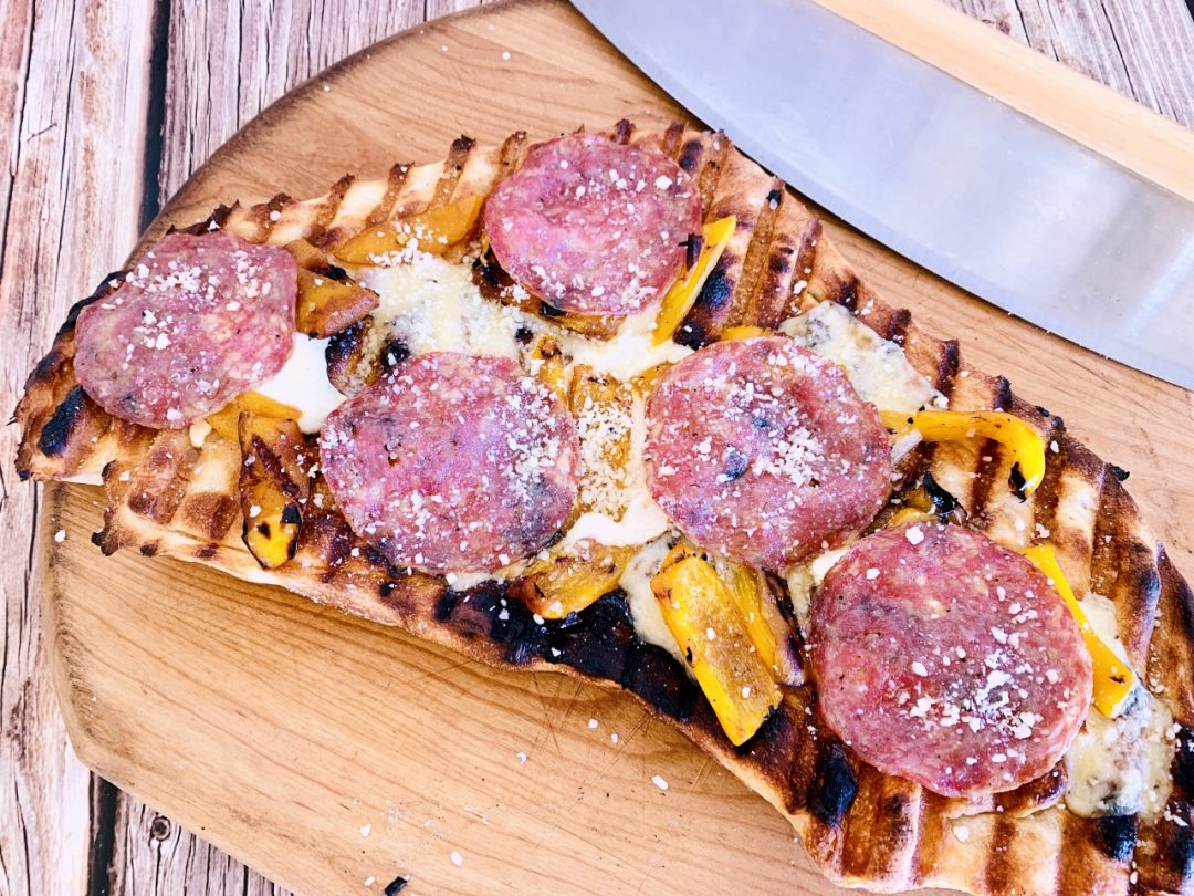 Grilled Flatbread with Truffle Cheese, Roasted Sweet Peppers & Salami – Recipe! Image 1