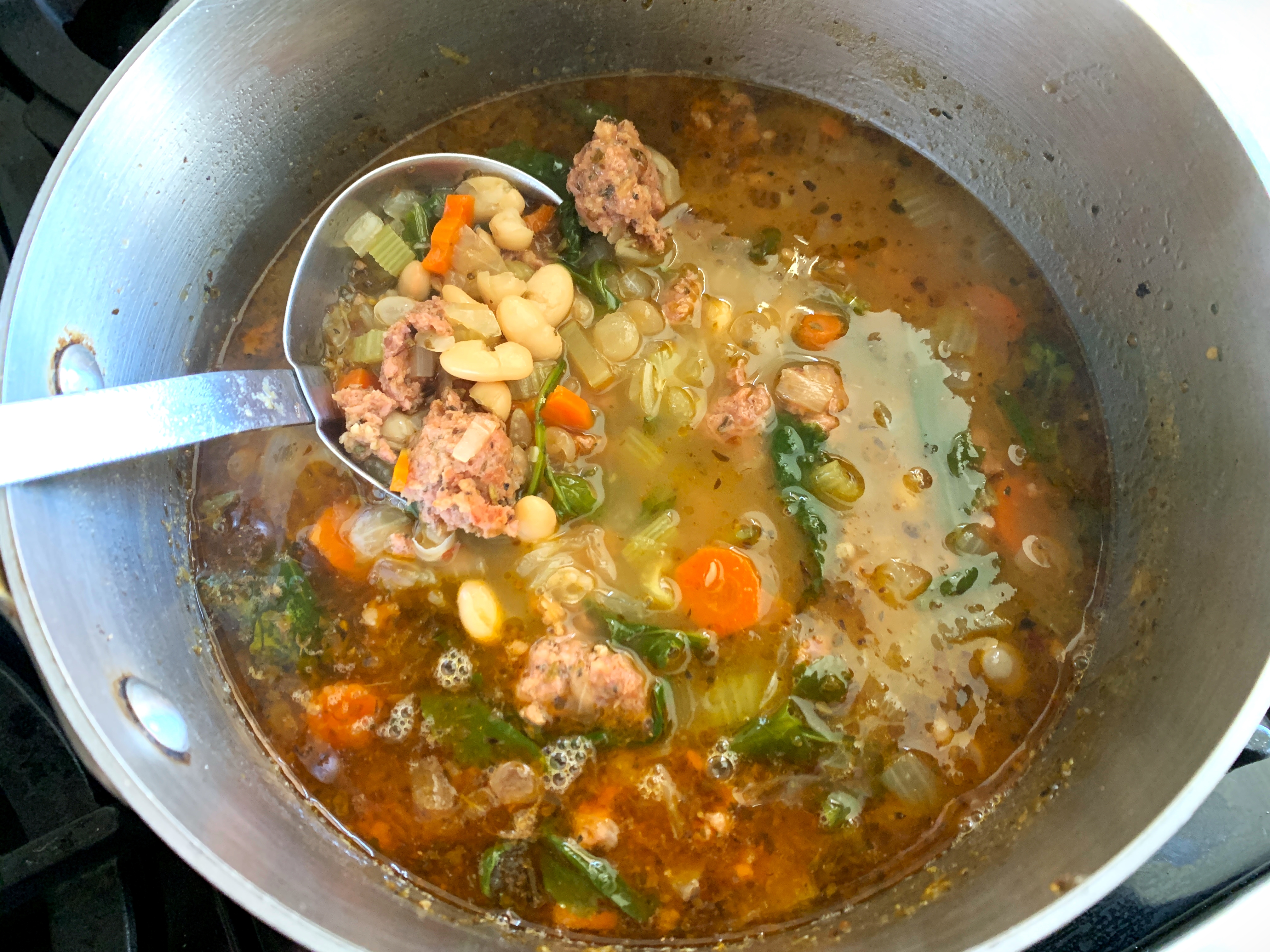 White Bean, Italian Sausage and Wilted Arugula Soup – Recipe! Image 3