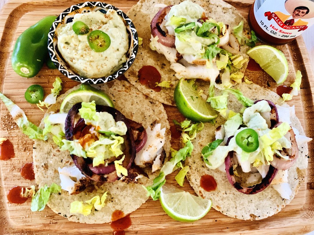 Grilled Sea Bass and Red Onion Tacos with Avocado Crema Recipe! Live. Love. Laugh. Food.