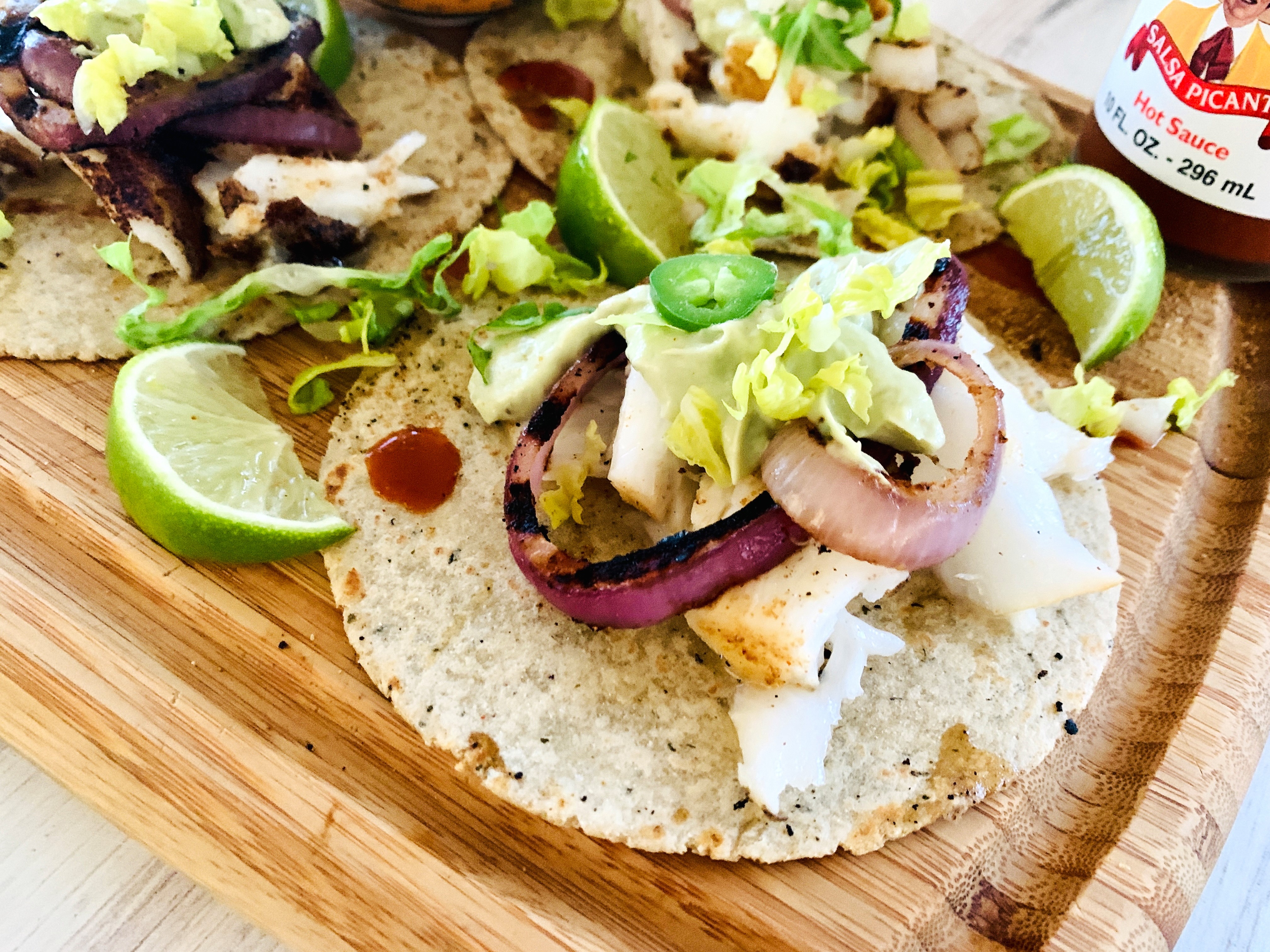 Grilled Sea Bass and Red Onion Tacos with Avocado Crema – Recipe! Image 3
